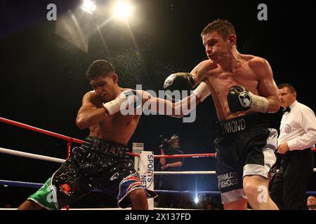 File photo dated 14/07/07 of England's Amir Khan (left) in action against Scotland's Willie Limond during the Commonwealth Lightweight Title fight at the O2 Arena, London. Former British and Commonwealth champion boxer Willie Limond has died at the age of 45, his boxing club has confirmed. He fell ill last week amid preparations for a fight. Issue date: Monday April 15, 2024. Stock Photo