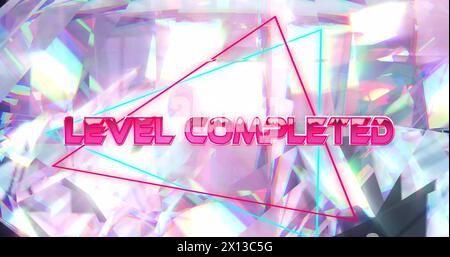 Image of level completed text over glowing crystal Stock Photo