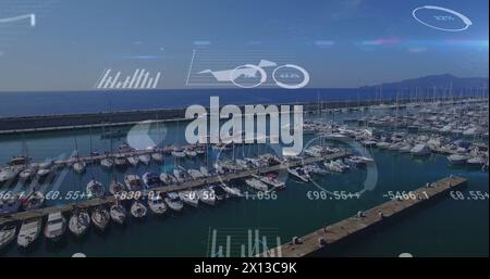 Image of financial data processing over yachts in port Stock Photo