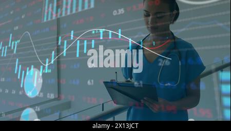 Image of data processing over caucasian female doctor Stock Photo