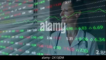 Image of data processing over caucasian female doctor Stock Photo