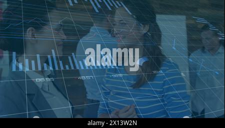 Image of statistical data processing over two diverse businesswomen discussing at office Stock Photo
