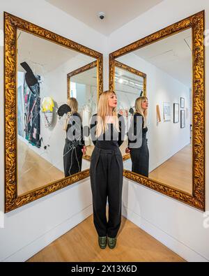 London, UK. 15th Apr, 2024. Michelangelo Pistoletto, Two Less One, Estimate £50,000 - 70,000 - Phillips, London, previews its New Now auction in London which features over 150 lots by established artists and emerging talents. It will be open to the public from 11 to 18 April.London, UK. 15 Apr 2024. Credit: Guy Bell/Alamy Live News Stock Photo