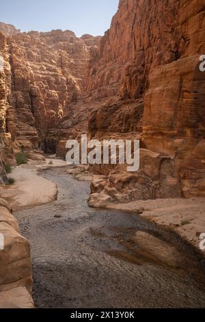 Vertical Scenery of Arnon Stream with Rocky Canyon in Jordan. Wonderful Outdoor Scene of Wadi Mujib Biosphere Reserve in the Middle East. Stock Photo