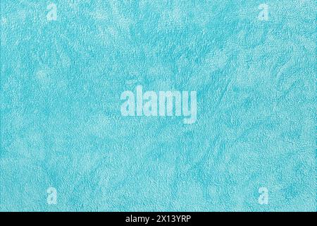 Abstract turquoise background of terry cloth closeup, top view Stock Photo