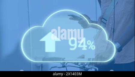 Image of digital cloud with percent going up over man using smartphone Stock Photo