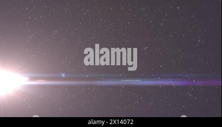 Image of glowing spots of lights over dark background Stock Photo