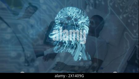 Image of computer circuit board head over caucasian male doctor with tablet Stock Photo