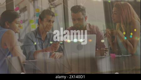 Image of financial graphs and data over diverse businesspeople talking in office Stock Photo