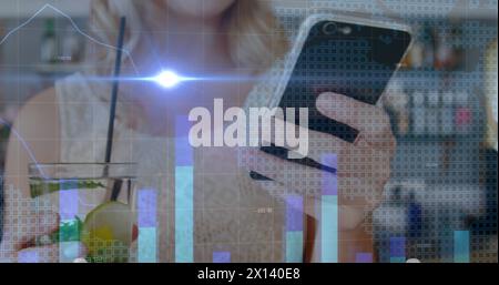 Image of light and graphs over midsection of caucasian woman using smartphone Stock Photo