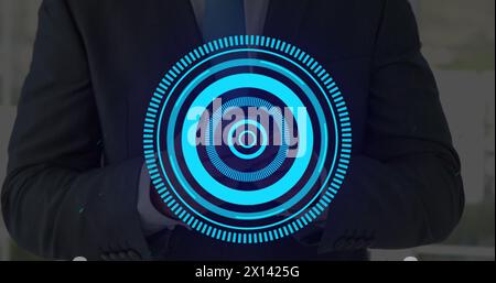 Image of processing circle over hands of caucasisn man using smartphone Stock Photo