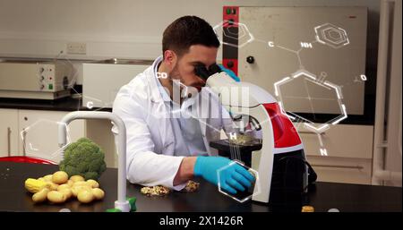 Image of chemical formulas over caucasian male lab worker using microscope Stock Photo