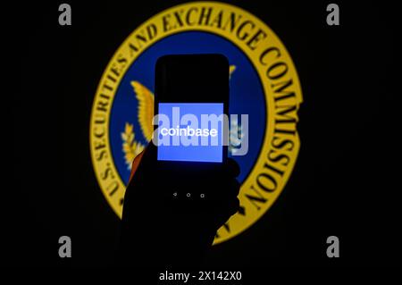 Poland. 15th Apr, 2024. In this photo illustration, a Coinbase logo is displayed on a smartphone with a SEC logo on the background. (Photo by Omar Marques/SOPA Images/Sipa USA) *** Strictly for editorial news purposes only *** Credit: Sipa USA/Alamy Live News Stock Photo