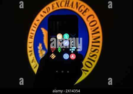 Poland. 15th Apr, 2024. In this photo illustration, cryptocurrencies logos are displayed on a smartphone with a SEC logo on the background. (Photo by Omar Marques/SOPA Images/Sipa USA) *** Strictly for editorial news purposes only *** Credit: Sipa USA/Alamy Live News Stock Photo