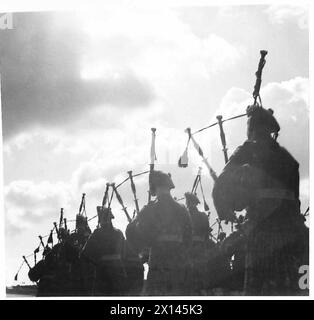 HIGHLAND PIPERS ON A ROUTE MARCH - The Pipe Band of the Highland Light Infantry on a route march British Army Stock Photo