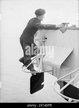 Halberd Rudder Guard Guiding a landing craft Stock Photo - Alamy