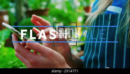 Image of flash sale text and qr code over caucasian woman using smartphone Stock Photo