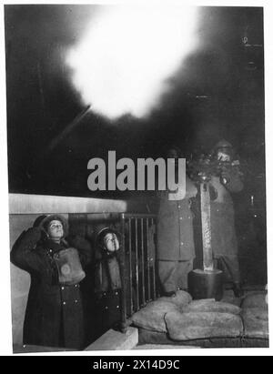 British Army territorial forces operating a 3.7-inch anti-aircraft gun ...