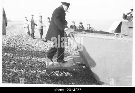 PRIME MINISTER INSPECTS DEFENCES - Mr. Winston Churchill goes aboard the boat in which he made his tour of inspection British Army Stock Photo