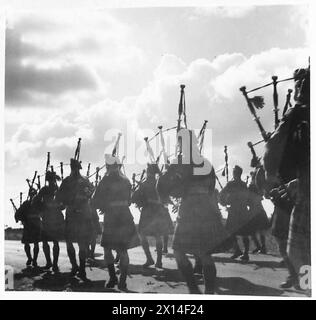 HIGHLAND PIPERS ON A ROUTE MARCH - The Pipe Band of the Highland Light Infantry on a route march British Army Stock Photo