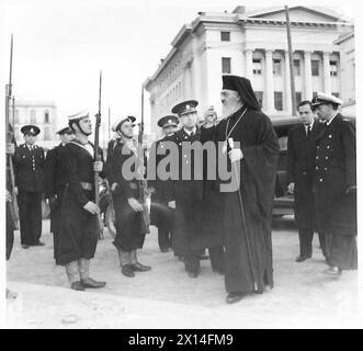 REGENT OF GREECE REVIEWS GREEK FLEET - Damaskinos arrives at the quayside at Piraeus to board the launch which will take him round the Greek Fleet British Army Stock Photo