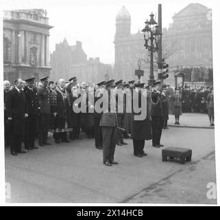 NORTHERN IRELANDS TRIBUTE TO RUSSIANS - Lieutenant General Sir Alan G. Cunningham, Mr. A.V. Alexander, and others at the saluting base British Army Stock Photo