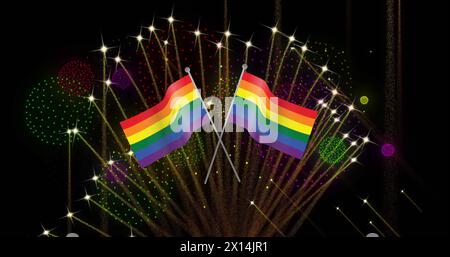 Image of pride rainbow flags and fireworks exploding on black background Stock Photo