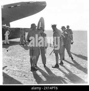 FIELD MARSHAL SMUTS VISITS THE SOUTH AFRICAN TROOPS IN THE WESTERN DESERT - Field Marshal Smuts being greeted on his arrival be aeroplane British Army Stock Photo