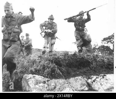 FRENCH COMMANDO SOLDIERS TRAIN AT A COMMANDO DEPOT - Close-up studies ...