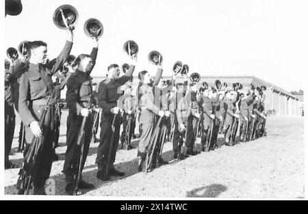 VISIT OF RUSSIAN DELEGATES TO CANTERBURY AND DOVER AREA - The troops on parade give a cheer for 'Our Russian Allies' British Army Stock Photo