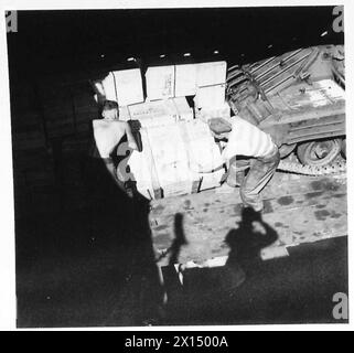 ON BOARD AN AFRICAN BOUND SHIP IN CONVOY - Unloading cargo British Army Stock Photo