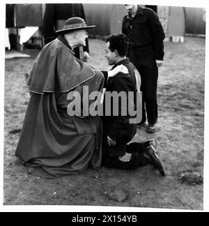Cardinal Hinsley visits an Italian prisoner of war camp, where ...