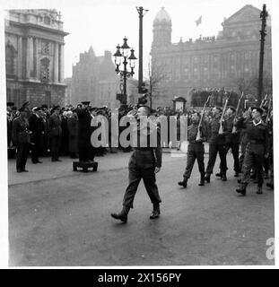 NORTHERN IRELANDS TRIBUTE TO RUSSIANS - Mr. A.V. Alexander, taking the salute as troops and A.T.S.march past the saluting base British Army Stock Photo