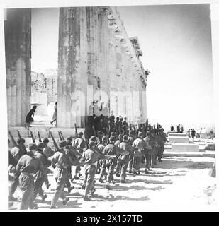 GREEK GOVERNMENT RETURNS TO ATHENS - British paratroopers march off after the ceremony of hoisting the Flag British Army Stock Photo