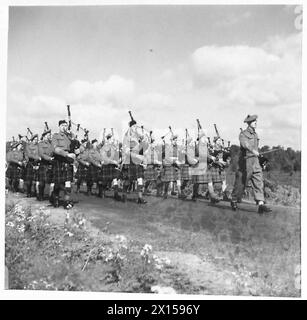 HIGHLAND PIPERS ON A ROUTE MARCH - The Pipe Band of the Highland Light Infantry on a route march British Army Stock Photo