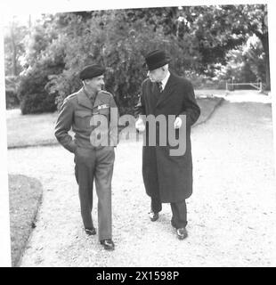 NEW ZEALAND PREMIER VISITS GENERAL MONTGOMERY�S H.Q. - Mr. Peter Fraser, Prime Minister of New Zealand, walking with General Montgomery in the grounds of the General's residence British Army Stock Photo