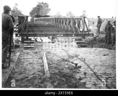 BRIDGING: 49 DIV. 1ST. CORPS B.L.A. - The bridge safely across British Army, 21st Army Group Stock Photo