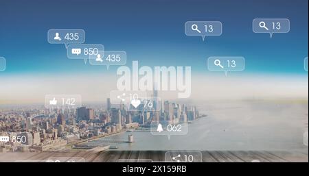 Image of social media reactions falling over cityscape Stock Photo