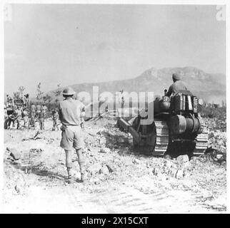 ITALY : CLEARING A ROAD THROUGH CASSINO - A bulldozer cutting through the rubble on the banks of the River Rapido British Army Stock Photo