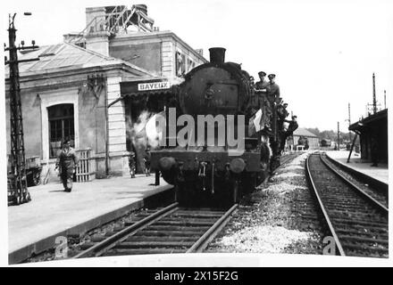 BRITISH REs DRIVE FIRST FRENCH ENGINE - The locomotive in Bayeux station at the completion of the run British Army, 21st Army Group Stock Photo