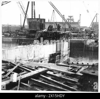 SPECIAL ASSIGNMENT FOR TN. 5 - View of the dry dock wall which was built to take concrete units. East India Docks. Contractors - R.McAlpine & Co British Army Stock Photo