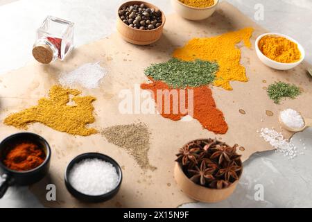 World map of different spices and products on light grey marble table Stock Photo