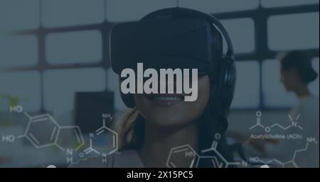Image of rotating human brain of brain of network of connections over computer Stock Photo