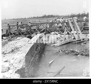 ITALY : CLEARING A ROAD THROUGH CASSINO - South AFrican sappers get to work rebuilding the Bailey bridges which were erected some weeks ago, but destroyed by enemy shellfire British Army Stock Photo