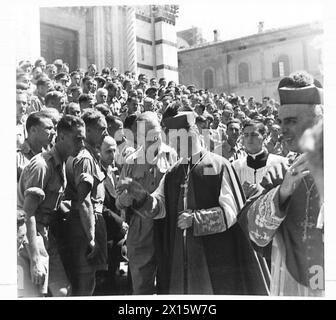 ITALY : ARCHBISHOP OF WESTMINSTER VISIT SIENA - The procession leaving the Cathedral after the service at which the Archbishop of Westminster gave the Address British Army Stock Photo