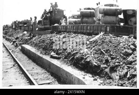 ITALY : EIGHTH ARMY : RAILWAY RECONSTRUCTION - The first train loaded with supplies arrived at the new railhead at Roccasecca British Army Stock Photo