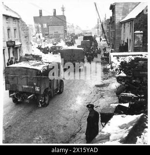 5TH SEAFORTH HIGHLANDERS PIPE BAND - General view in Hotton, a riverside village on the way to La Roche, showing British Troops of 51 Highland Div moving up to the attack British Army, 21st Army Group Stock Photo