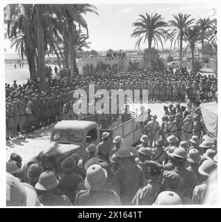 FIELD MARSHAL SMUTS VISITS THE SOUTH AFRICAN TROOPS IN THE WESTERN DESERT - The troops listening to the speech delivered by the Field Marshal after he had inspected them British Army Stock Photo