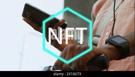 Image of nft text in hexagon over midsection of african american man using cellphone Stock Photo