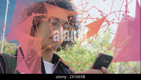Image of dots connecting with lines forming geometric shapes over biracial man using cellphone Stock Photo